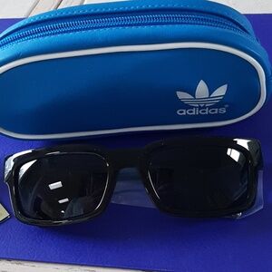 adidas Bright Blue Eyewear Pouch with White Trim And Black Sunglasses